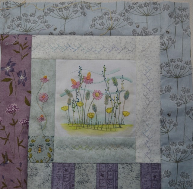 Embroidered filed of flowers