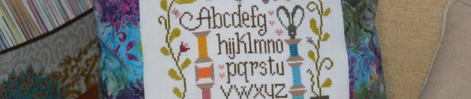 Sewing room cushion; www.thecraftycreek.com